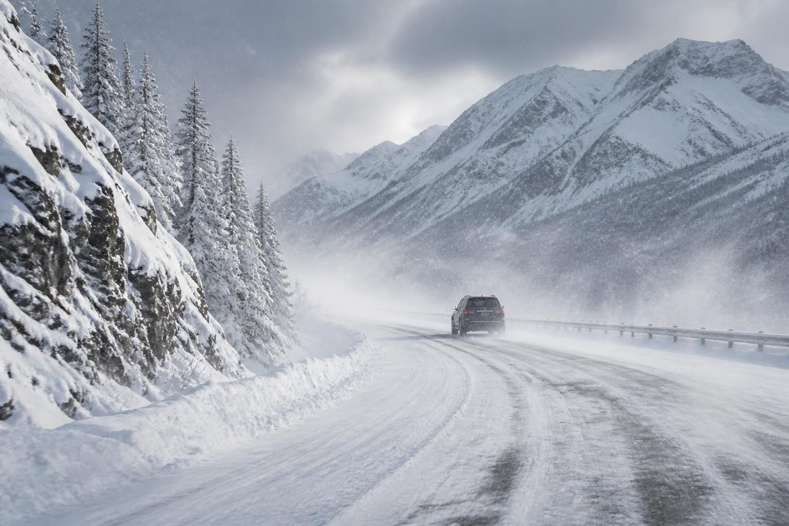 Snow falling on a remote Alaska mountain highway near Atigun Pass